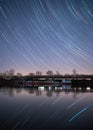 Moored boat and clear sky with star trails at night