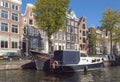 Moored boats on the canal of Amsterdam