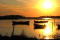 Moored boats in the sunset Royalty Free Stock Photo