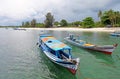Moored boats at Tanjung Kelayang Beach on Belitung Island.