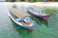Moored boats at Tanjung Kelayang Beach on Belitung Island.
