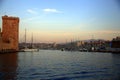 Moored boats in the Vieux Port of Marseille, France, with a view of the fort tower in the light of sunset Royalty Free Stock Photo