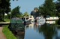 Moored Canal boats at bend in Canal