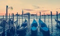 Gondolas in Venice Italy at dusk. Royalty Free Stock Photo