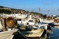 Moored fishing boats in port of Koper. Mooring of the small fishing vessel at the dock