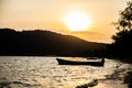 Moored fishing boats at sunset on the sands of a quiet island Royalty Free Stock Photo