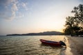 Moored fishing boats at sunset on the sands of a quiet island Royalty Free Stock Photo