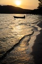 Moored fishing boats at sunset on the sands of a quiet island Royalty Free Stock Photo