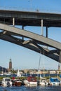 Moored leisureboats under VÃÂ¤sterbron bridge Stockholm Royalty Free Stock Photo