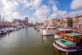 Moored motor yachts in a canal in the Dutch city of Dordrecht Royalty Free Stock Photo