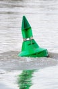 Moored river buoy to show navigation channel for ships Royalty Free Stock Photo