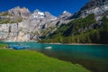 Moored rowing boats on the lake Oeschinensee, Bernese Oberland, Switzerland