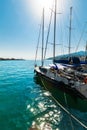 Moored Sailboats In Coast During Sunny Day