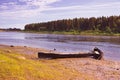 Unusual elongated wooden boats of the Mansi people in Siberia Royalty Free Stock Photo