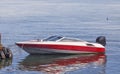 Moored white and red motor boat on the background of the sea Royalty Free Stock Photo