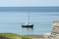 Moored yacht off Brighton Marina. England Royalty Free Stock Photo