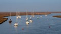 Moored Yachts as the sun sets on East Fleet Estuary, Norfolk.