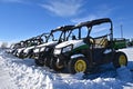 New John Deere Gators covered with now