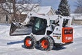 Bobcat skid steer removing snow Royalty Free Stock Photo