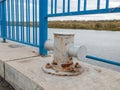 mooring at the berth by the river in the port, fixing ropes for parking Royalty Free Stock Photo