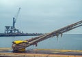 Mooring cleat and steel rope or hawser Royalty Free Stock Photo