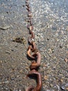 Mooring chain for boat leading into distance