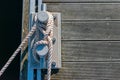 Mooring cleat on a wooden pier Royalty Free Stock Photo