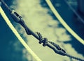 Mooring compensator of rope tension. Detail of boat. Royalty Free Stock Photo