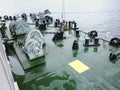 Mooring part of the barge deck. Babin with chains from the anchors. Mooring devices. Bitteng on the deck