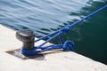 Mooring post in the port for fixing yachts and ships of boats