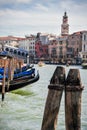 Mooring Posts and Gondolas on the Grand Canal Royalty Free Stock Photo