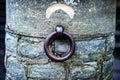 Mooring ring with worn stone Royalty Free Stock Photo