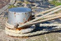 Mooring rope coiled around a bollard Royalty Free Stock Photo