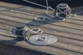 Mooring rope with a knotted on a wooden pier