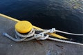 Mooring ropes attached to bitt Royalty Free Stock Photo