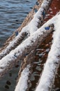 Mooring ropes from the sea ship against the background of the waters Royalty Free Stock Photo