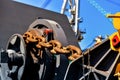 Shipyard, Mooring winch with big chain anchor at station ship deck. Royalty Free Stock Photo