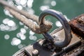 A mooring tiedown point with rope with selective focus located on the jetty at beachport south australia on november 9th 2020 Royalty Free Stock Photo