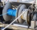 Mooring winch mechanism with hawser on ship deck Royalty Free Stock Photo