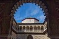 Moorish dome through in the pointed arch in Seville, Spain, Euro Royalty Free Stock Photo