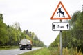 Moose warning roadsign in a rural russian landscape