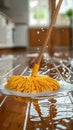 Mop and Broom on Tiled Floor Royalty Free Stock Photo