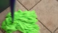 Mop cleaning tiles