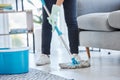 Mop, flooring and woman cleaning living room house, home and apartment. Cleaner, maid and housekeeping service on wet Royalty Free Stock Photo