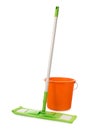 Mop with green microfiber rag, white plastic handle and orange bucket  isolated on a white background Royalty Free Stock Photo