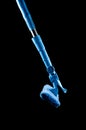 Mop with a rag of blue color for washing glasses and mirrors on a black background, isolate