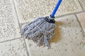 Mop sweeper to clean the floor Royalty Free Stock Photo