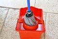Mop sweeper to clean the floor Royalty Free Stock Photo