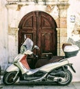 Moped Blocking Courtyard Entrance