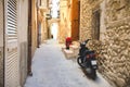 Moped scooter narrow street alley gargano